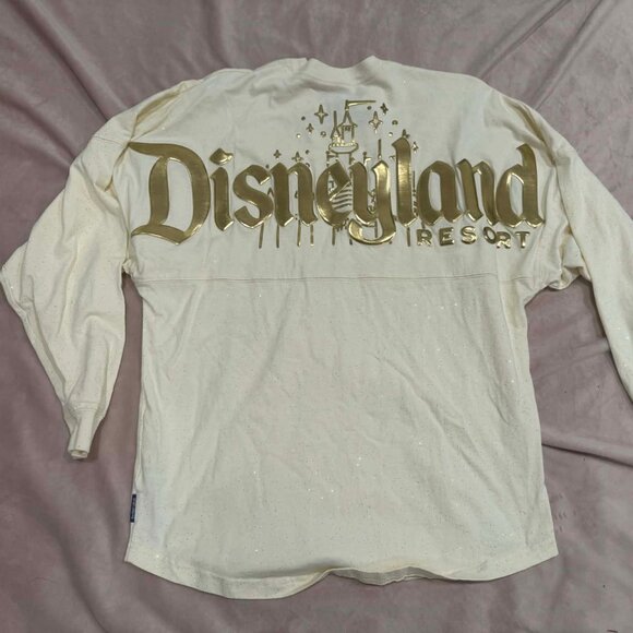 Disney Tops - Disneyland Resort Pixie Dust Cream/Gold Spirit Jersey w/ Gold Foil Logo, Small